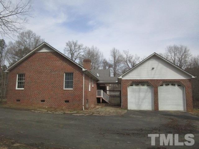1307 Burlington Road Roxboro, NC 27573 - Photo 2 of 14 a view of a house with a yard