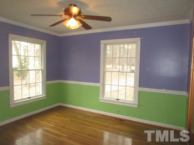 1307 Burlington Road Roxboro, NC 27573 - Photo 12 of 14 a view of empty room with window and fan