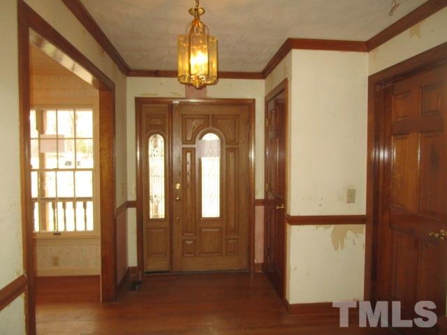 1307 Burlington Road Roxboro, NC 27573 - Photo 3 of 14 a view of gallery with chandelier
