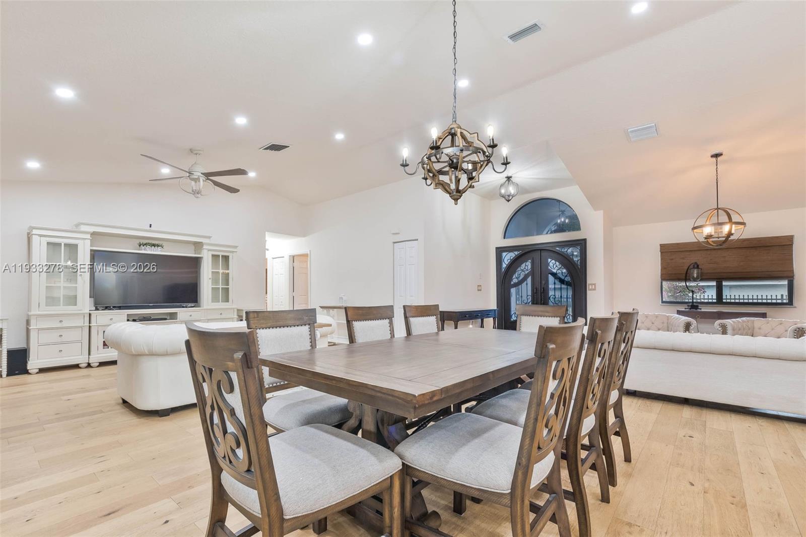 27260 Southwest 167th Court Homestead, FL 33031 - Photo 14 of 44 a view of a dining room with furniture window and wooden floor
