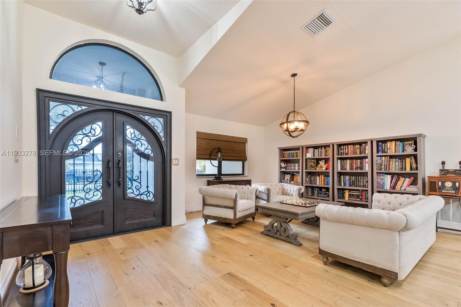 27260 Southwest 167th Court Homestead, FL 33031 - Photo 18 of 44 a living room with furniture a rug and a window