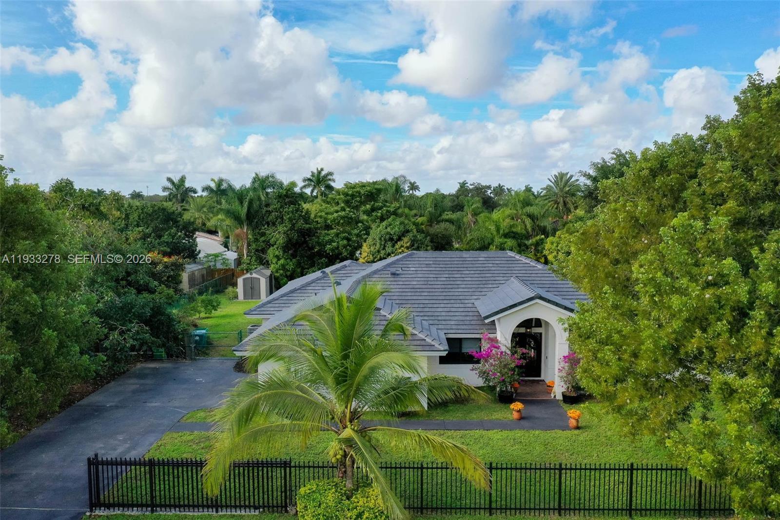 27260 Southwest 167th Court Homestead, FL 33031 - Photo 2 of 44 an aerial view of a house