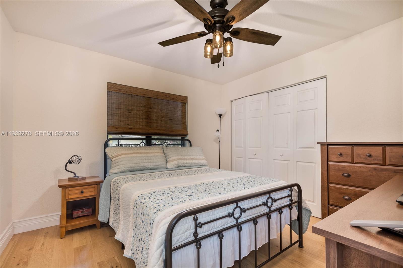 27260 Southwest 167th Court Homestead, FL 33031 - Photo 25 of 44 a bedroom with a bed and a tv