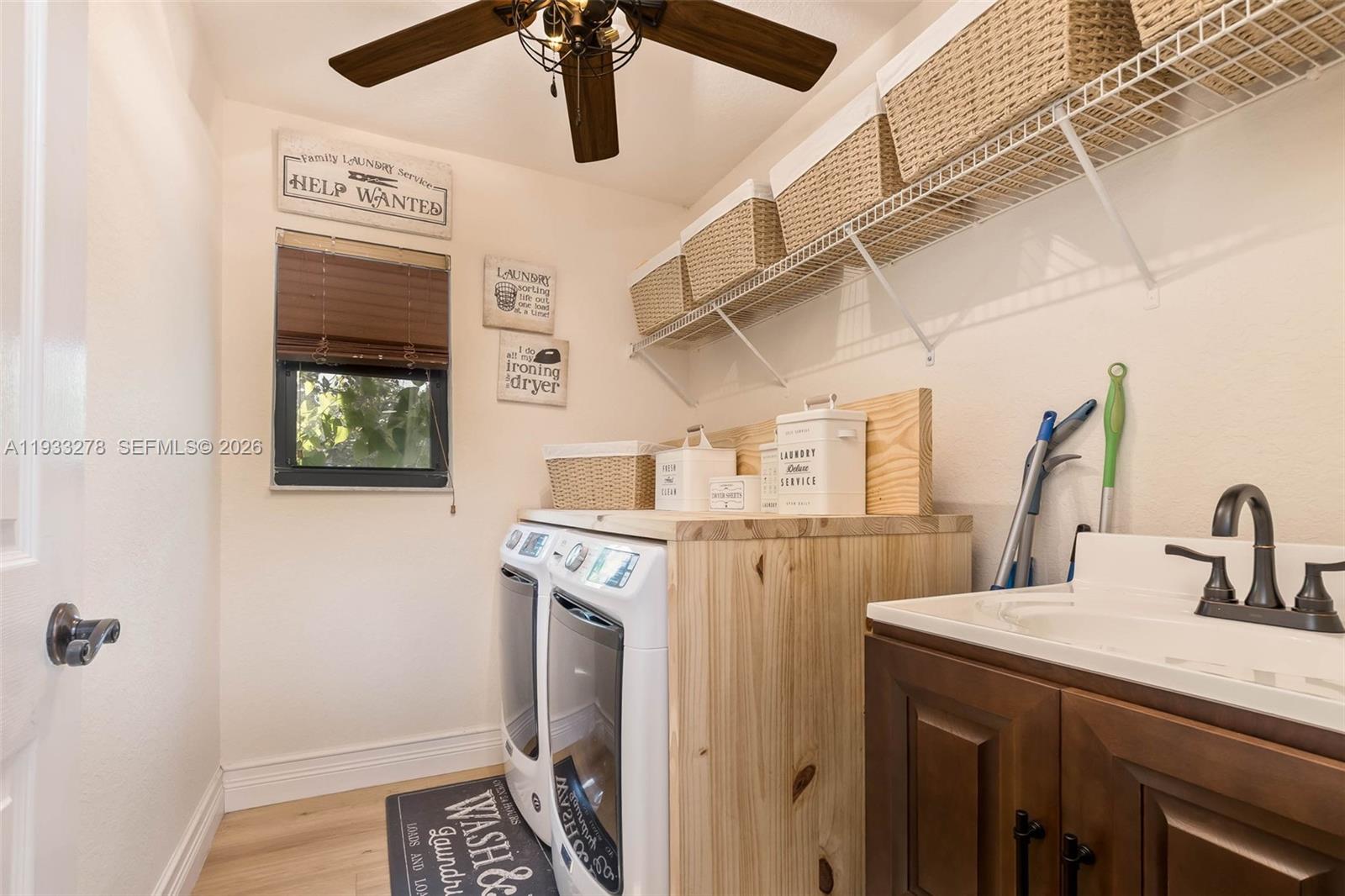 27260 Southwest 167th Court Homestead, FL 33031 - Photo 27 of 44 a utility room with dryer and washer