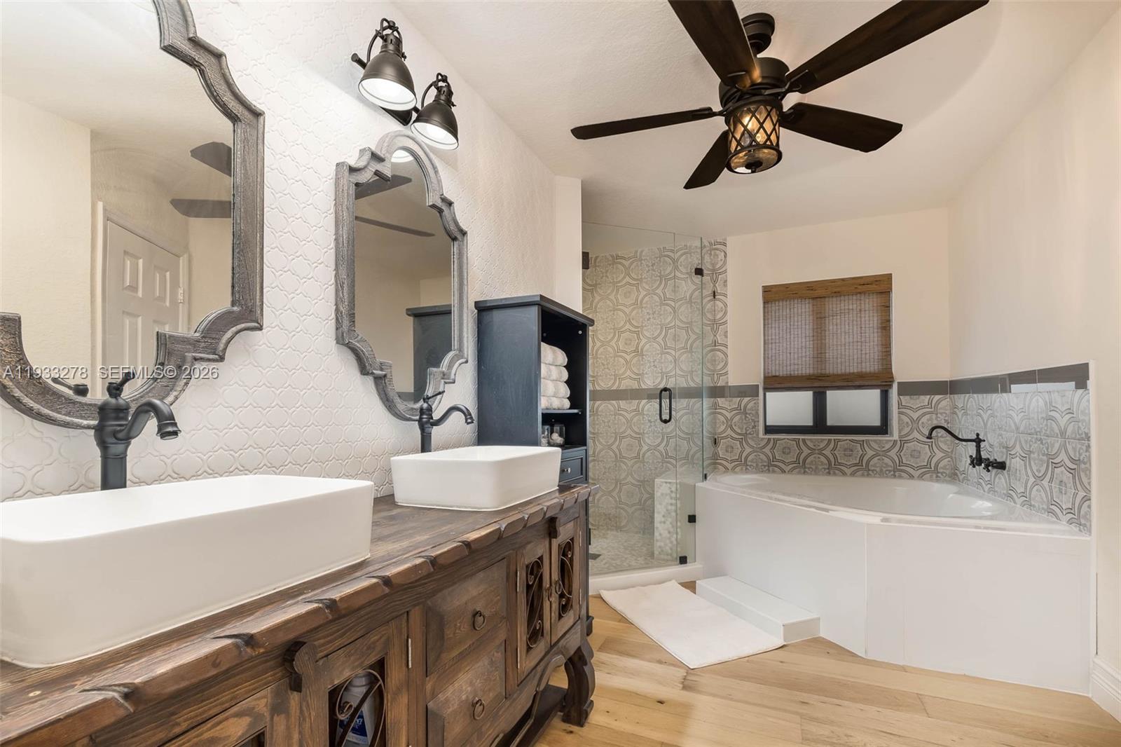 27260 Southwest 167th Court Homestead, FL 33031 - Photo 28 of 44 a bathroom with a sink and a mirror