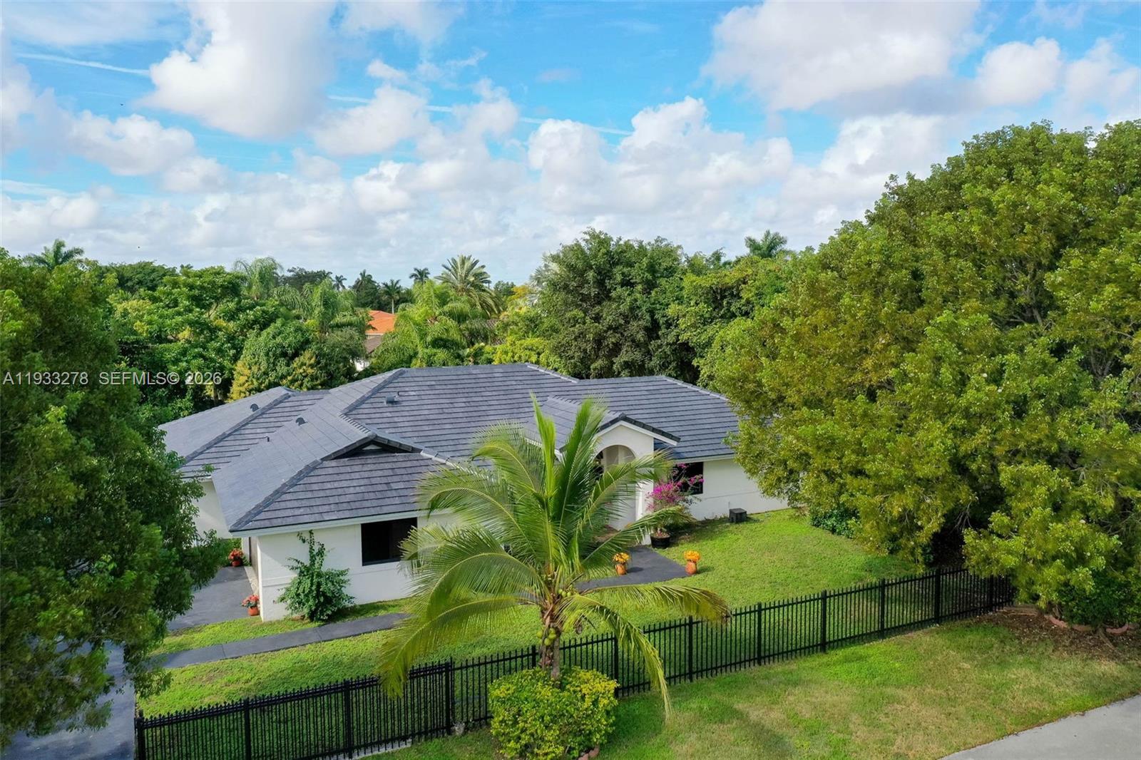 27260 Southwest 167th Court Homestead, FL 33031 - Photo 3 of 44 a view of a yard in front of a house