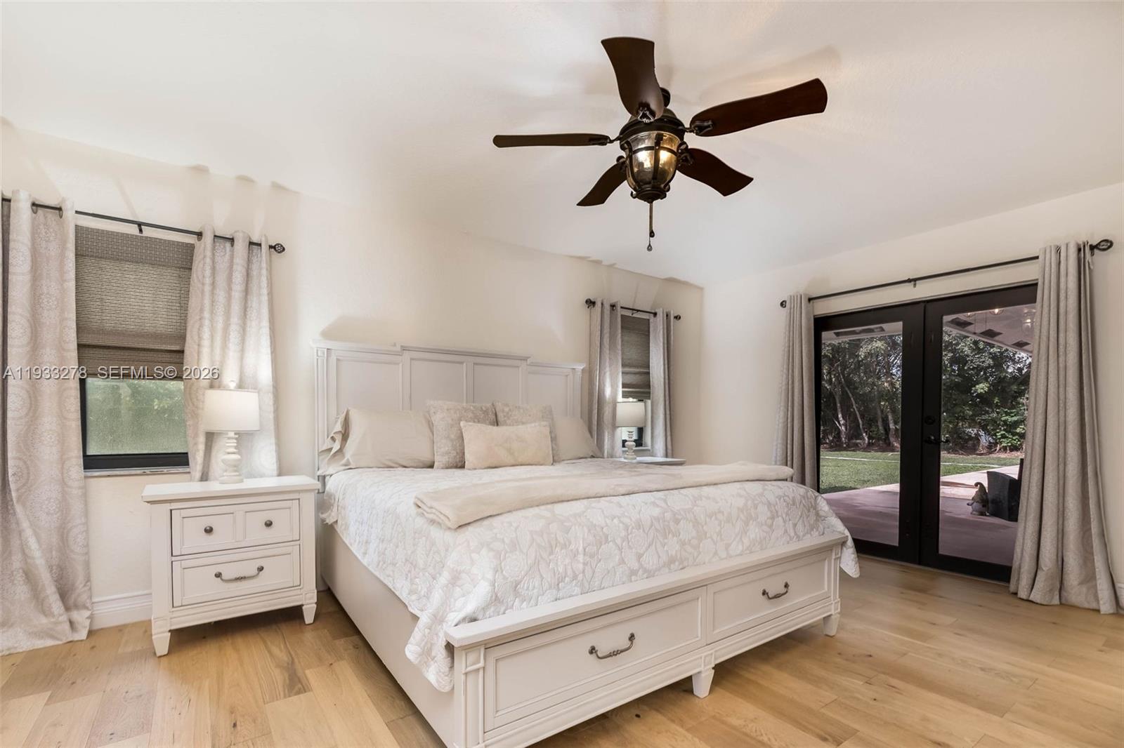 27260 Southwest 167th Court Homestead, FL 33031 - Photo 31 of 44 a bedroom with a bed and a large window