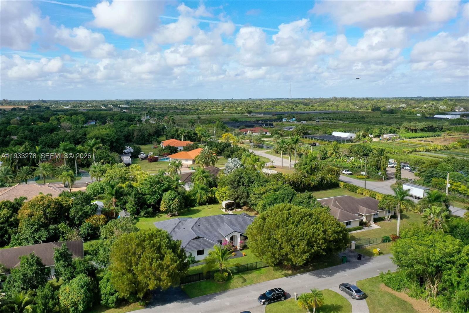 27260 Southwest 167th Court Homestead, FL 33031 - Photo 33 of 44 a view of a lake with green space
