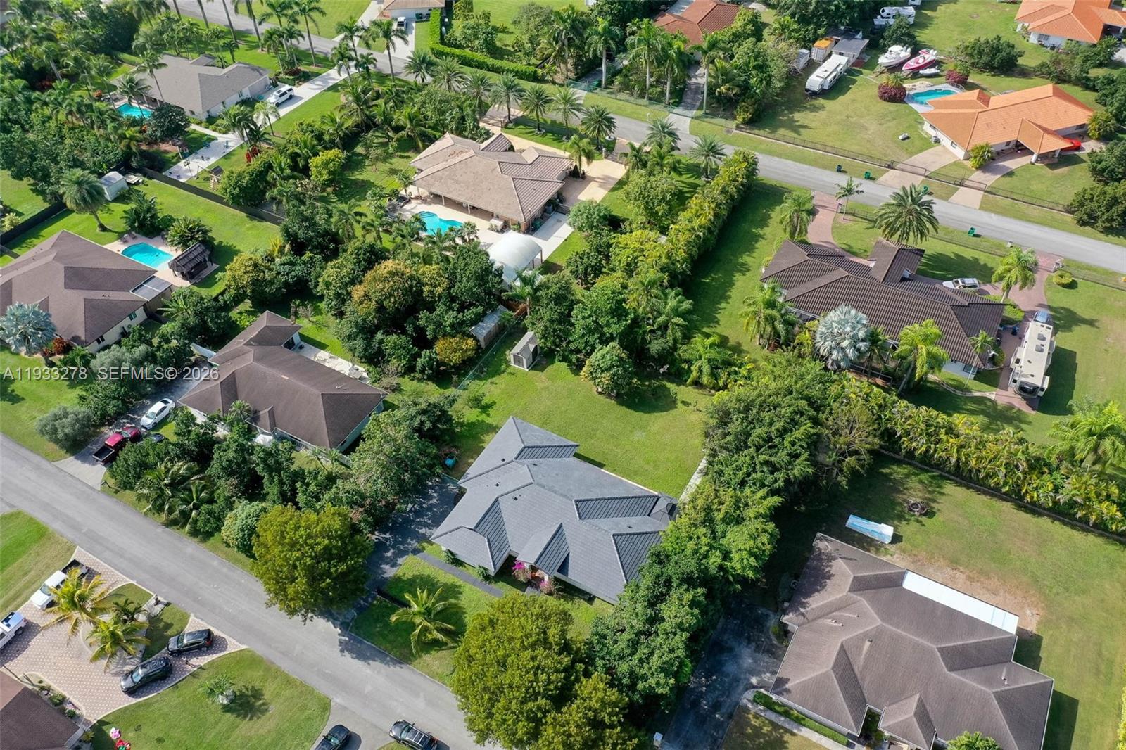 27260 Southwest 167th Court Homestead, FL 33031 - Photo 40 of 44 an aerial view of residential houses with outdoor space