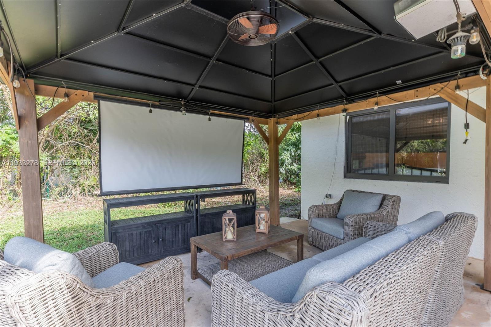 27260 Southwest 167th Court Homestead, FL 33031 - Photo 10 of 44 a bedroom with furniture and a window