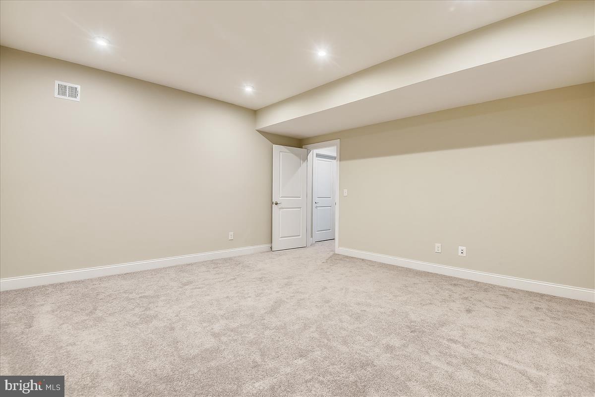 40789 Foxtail Fields Drive Aldie, VA 20105 - Photo 48 of 63 Basement media room