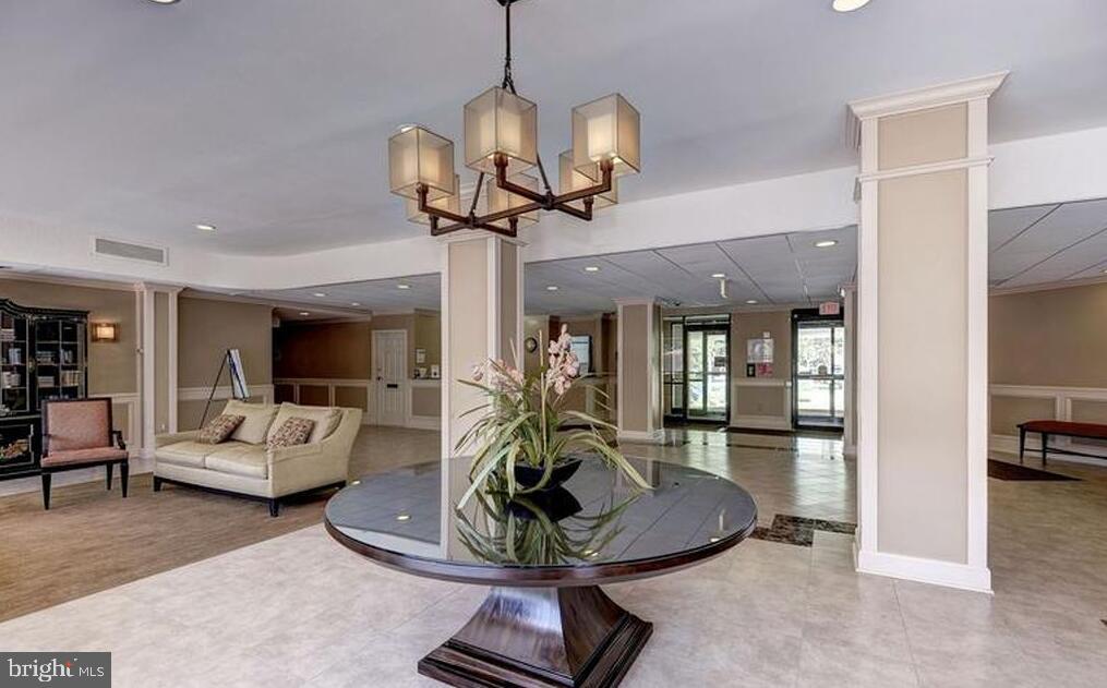 6800 Fleetwood Road, Unit 913 McLean, VA 22101 - Photo 3 of 13 Elegant lobby with modern charm.