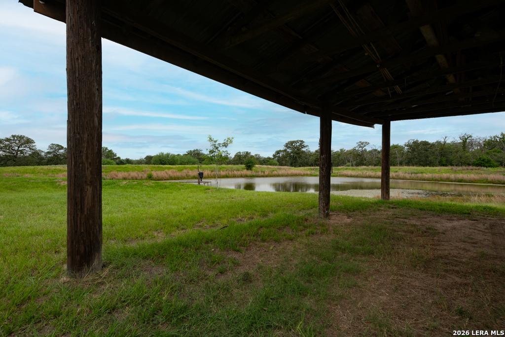 104 Longhorn Road Stockdale, TX 78160 - Photo 20 of 47 a view of outdoor space with deck and yard