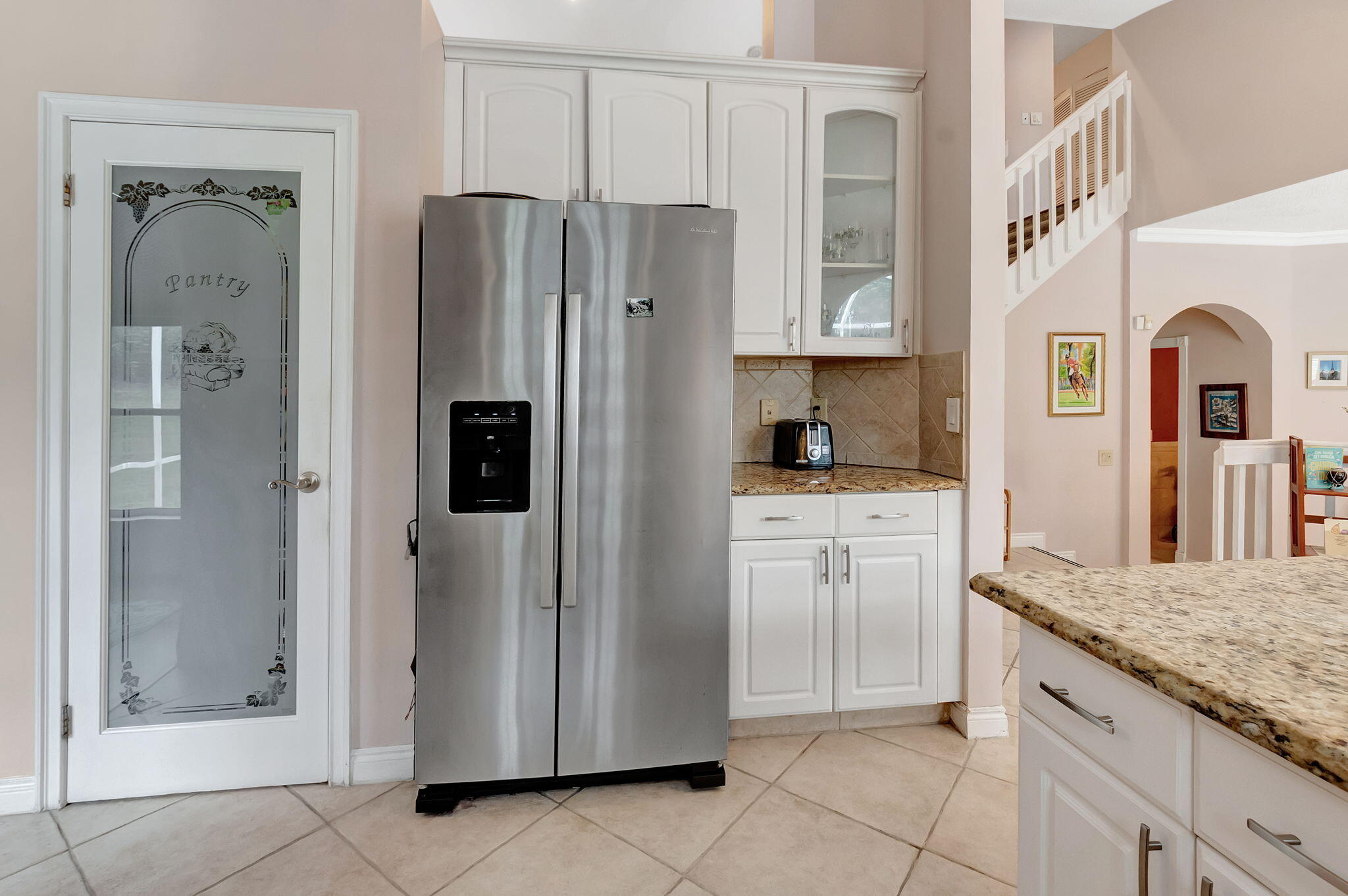 19952 Dinner Key Drive Boca Raton, FL 33498 - Photo 18 of 94 a kitchen with stainless steel appliances granite countertop a refrigerator and a stove