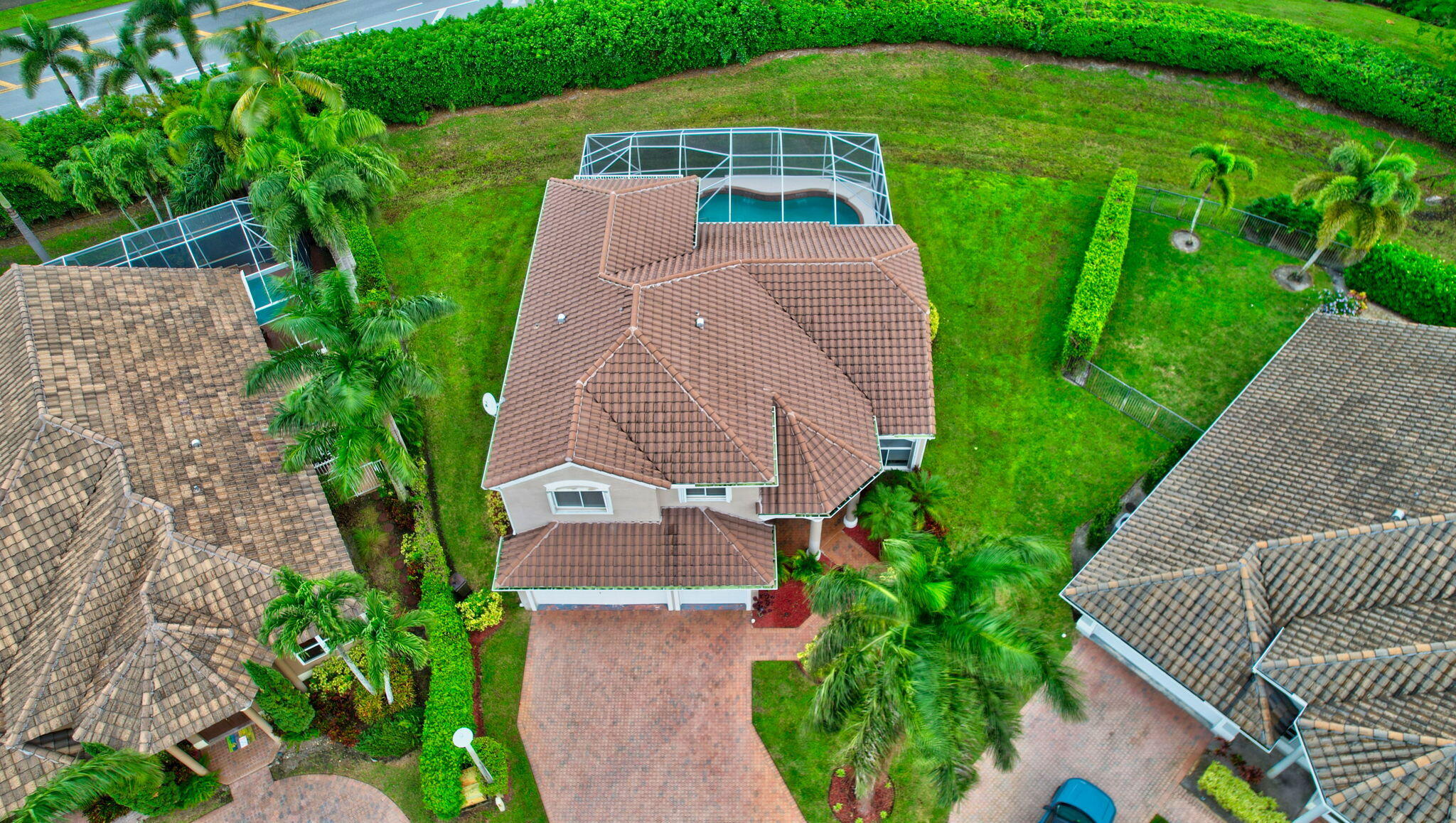 19952 Dinner Key Drive Boca Raton, FL 33498 - Photo 43 of 94 a aerial view of a house with a yard and potted plants