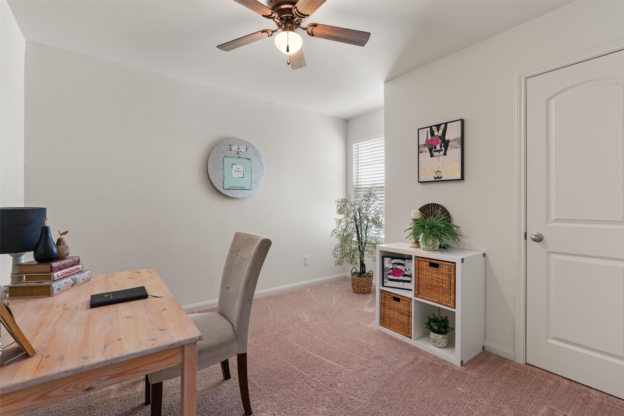 163 Niven Path, Unit 12K Jarrell, TX 76537 - Photo 20 of 31 a view of a workspace with furniture and a chair