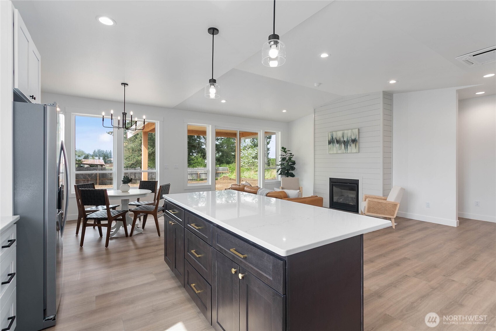412 West 4th Street Everson, WA 98247 - Photo 24 of 31 a large kitchen with a table and chairs