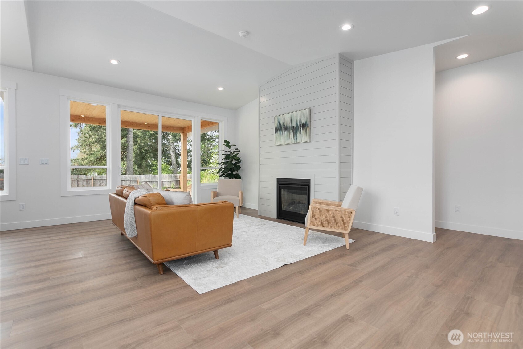 412 West 4th Street Everson, WA 98247 - Photo 25 of 31 a living room with furniture and a fireplace