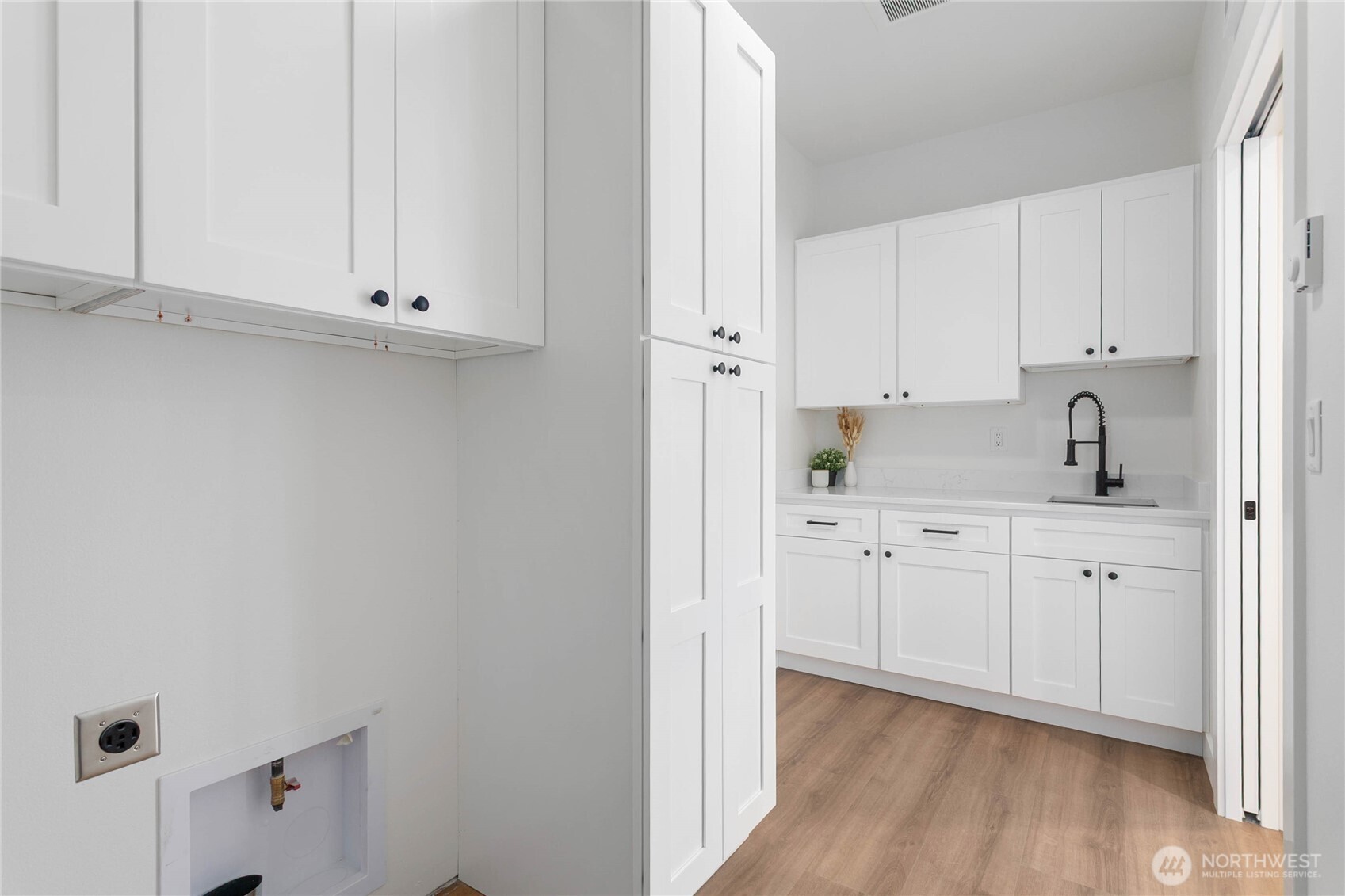 412 West 4th Street Everson, WA 98247 - Photo 26 of 31 a kitchen with white cabinets and sink