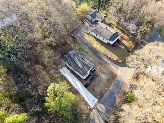 a view of a backyard with wooden floor