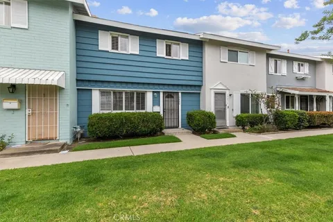 a house view with a garden space