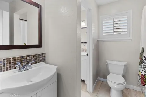 a bathroom with a sink and a toilet