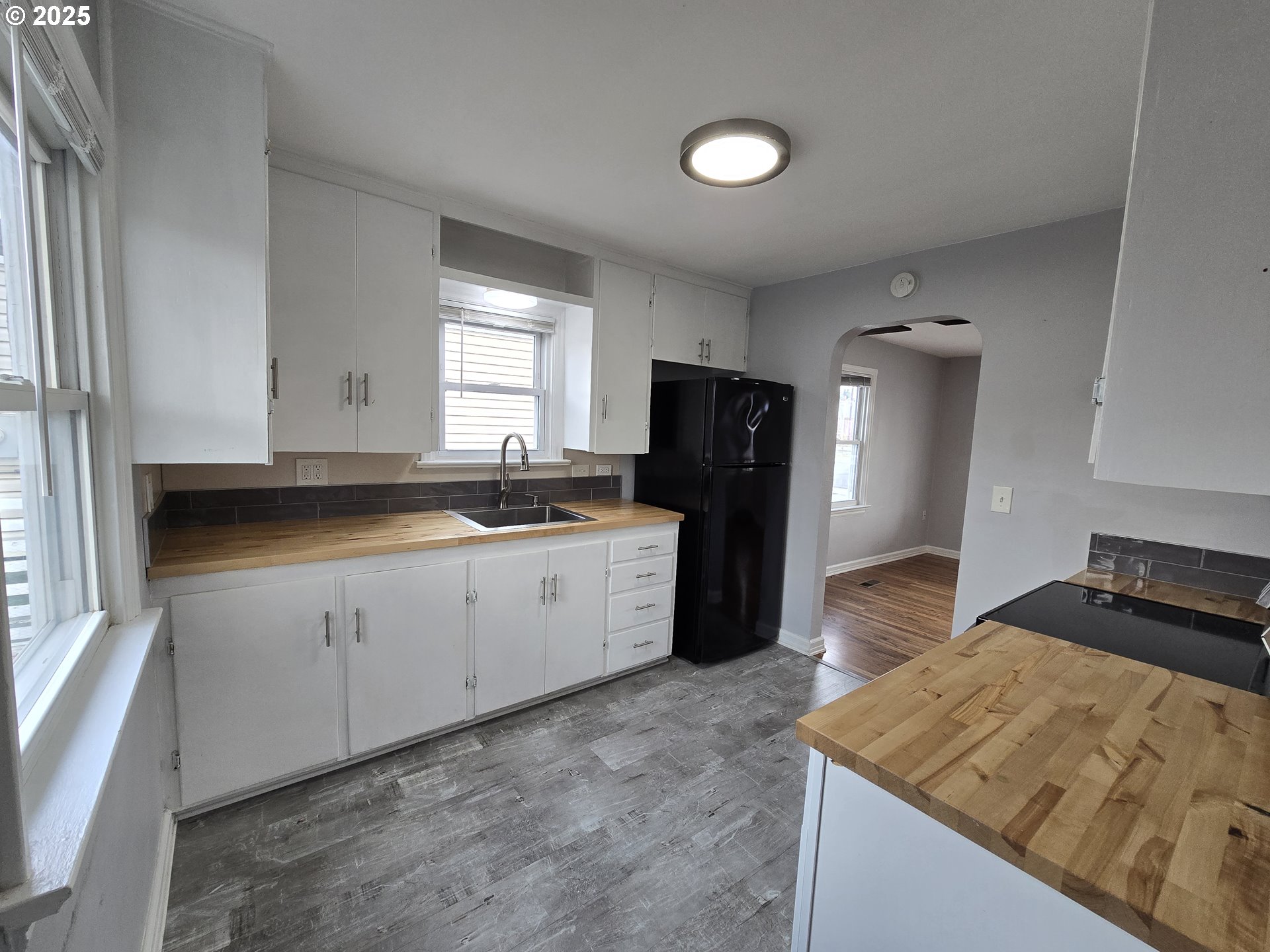 210 Southwest 3rd Street Hermiston, OR 97838 - Photo 15 of 24 a kitchen with a refrigerator stove and sink