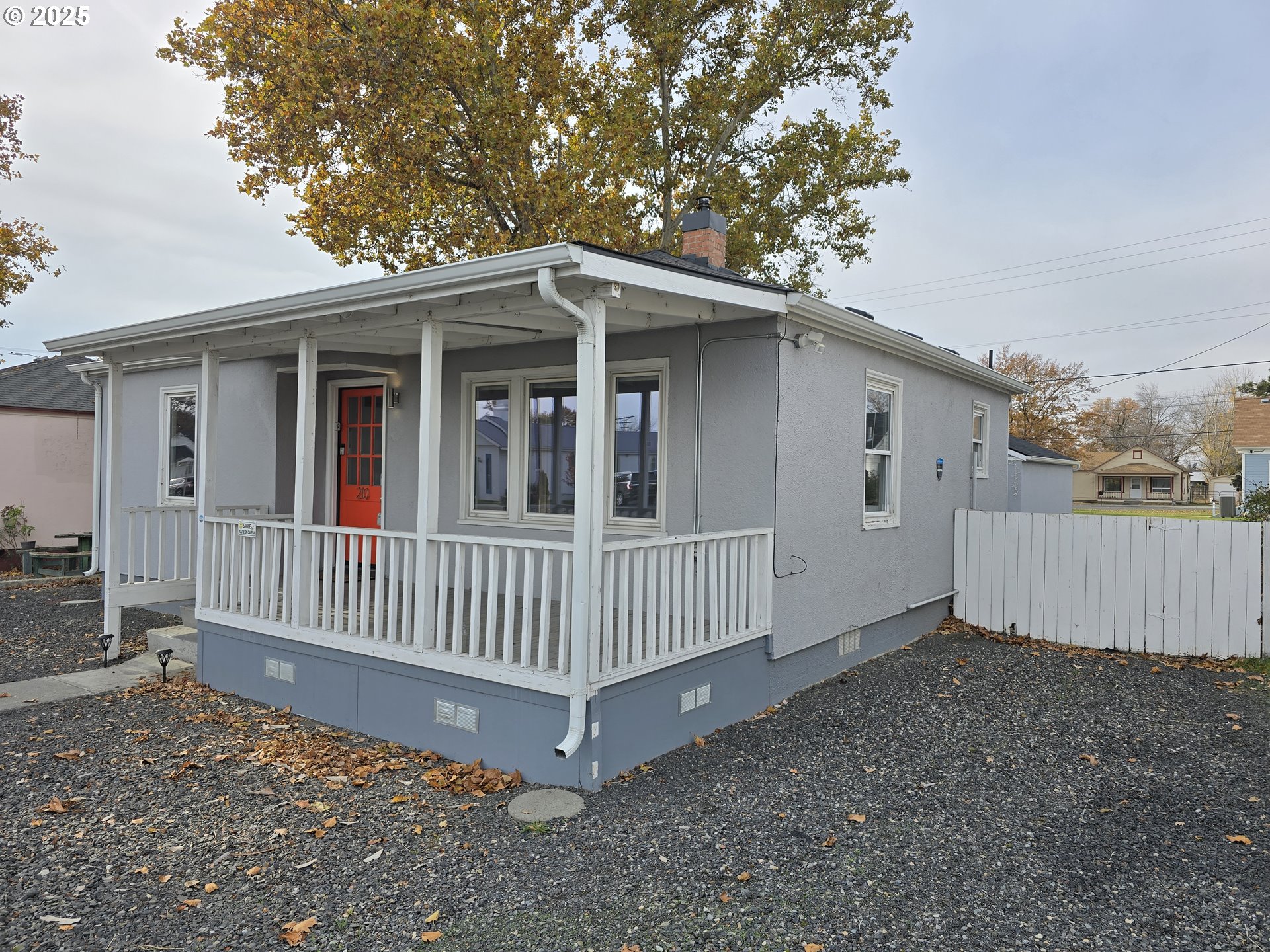 210 Southwest 3rd Street Hermiston, OR 97838 - Photo 2 of 24 a view of a house with a yard