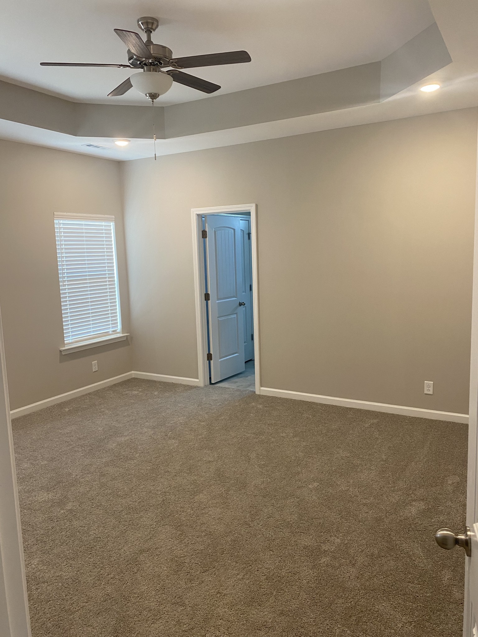 417 Ruby Cate Way Murfreesboro, TN 37128 - Photo 9 of 11 an empty room with windows and fan