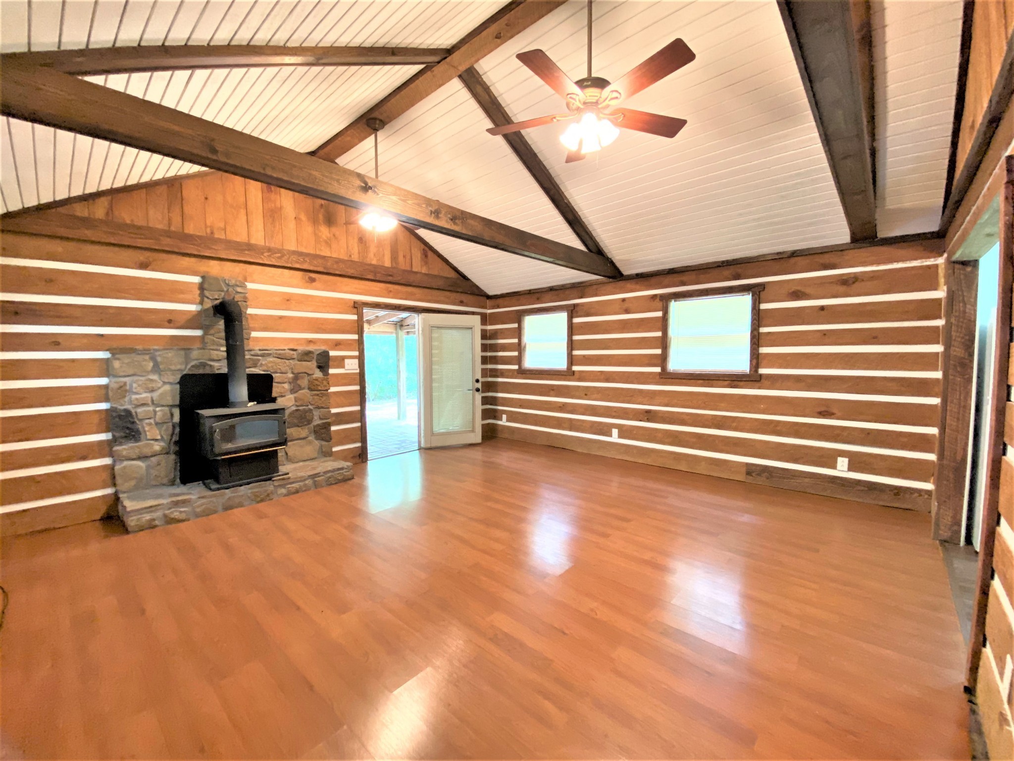 a view of a hardwood & utility room