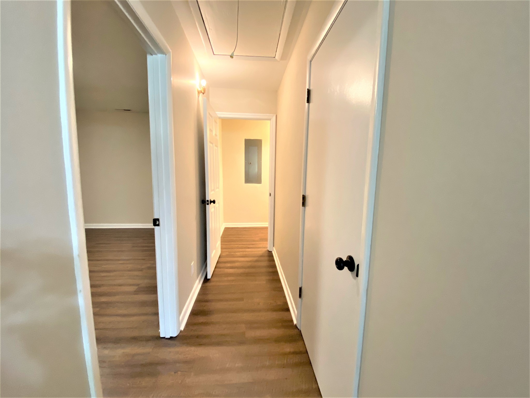 1035 West Point Road Lawrenceburg, TN 38464 - Photo 17 of 42 a view of a hallway with a wooden door