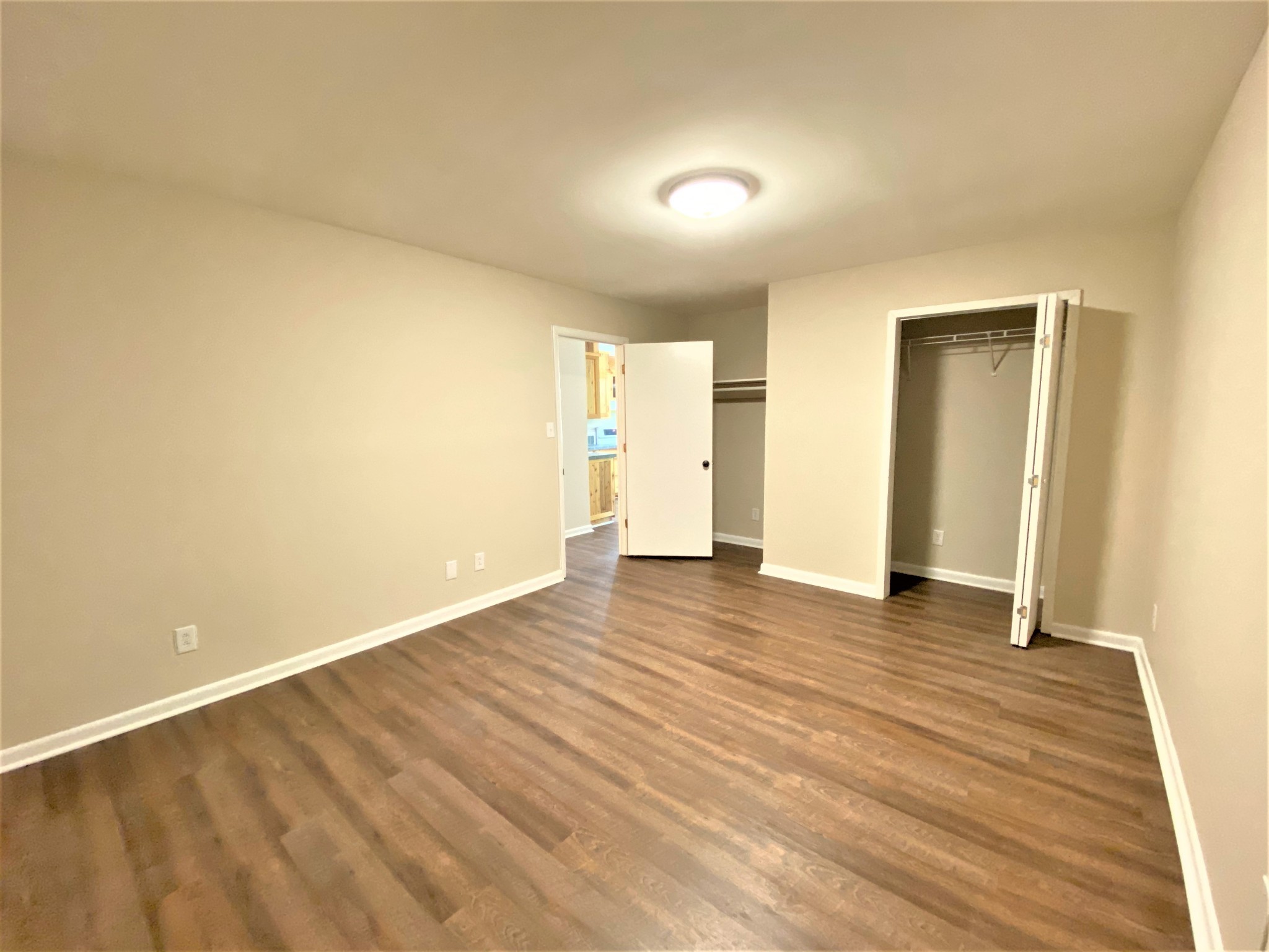 1035 West Point Road Lawrenceburg, TN 38464 - Photo 20 of 42 wooden floor in an empty room