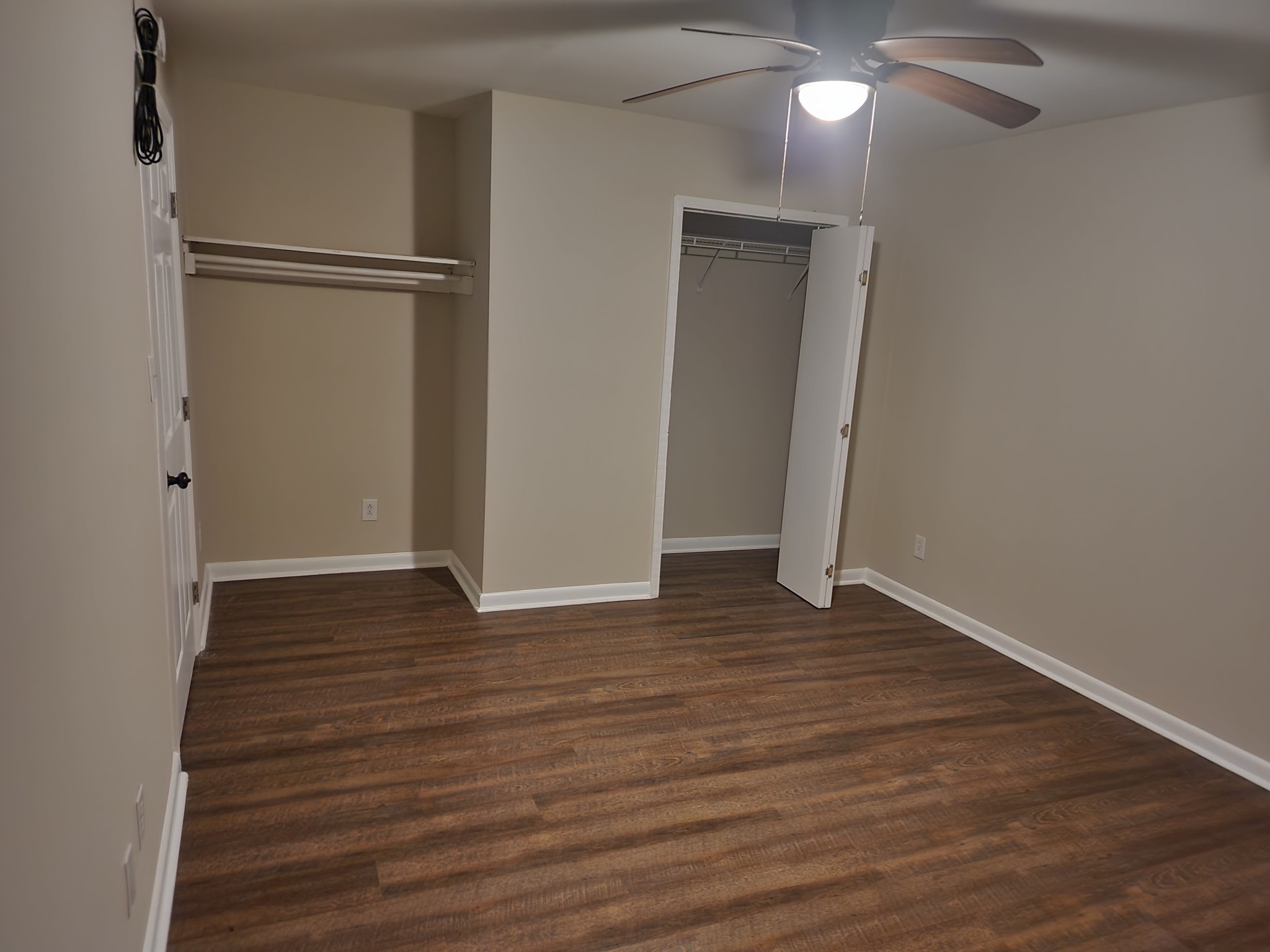 1035 West Point Road Lawrenceburg, TN 38464 - Photo 21 of 42 a view of an empty room with wooden floor