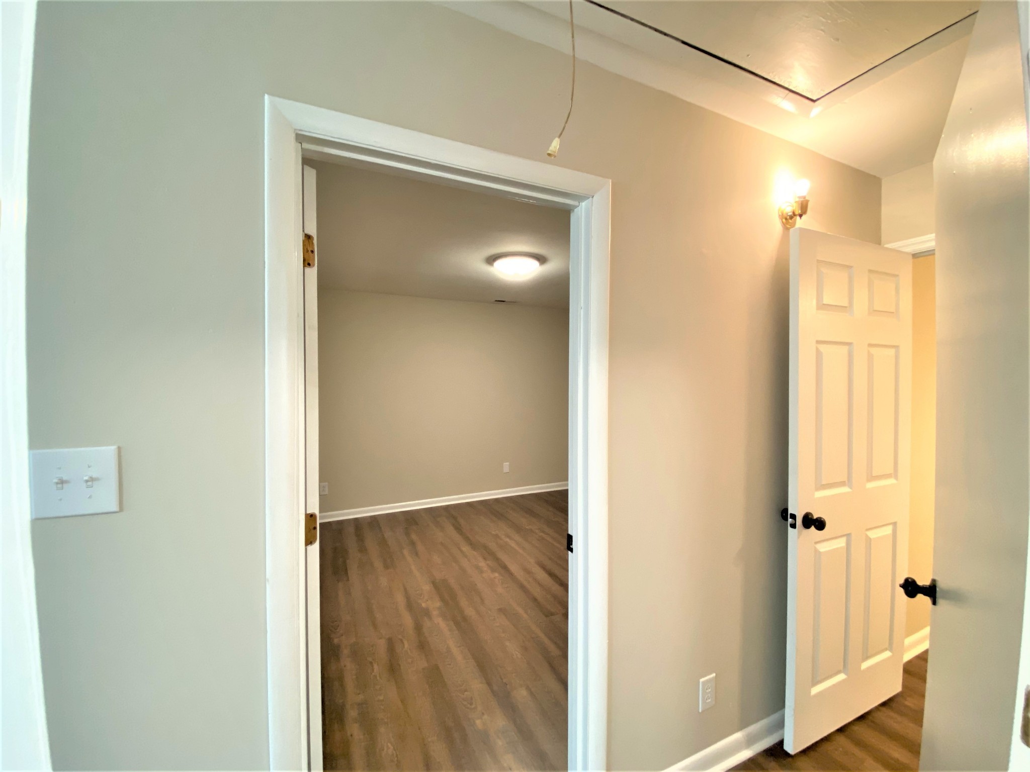 1035 West Point Road Lawrenceburg, TN 38464 - Photo 26 of 42 a view of a hallway with wooden floor