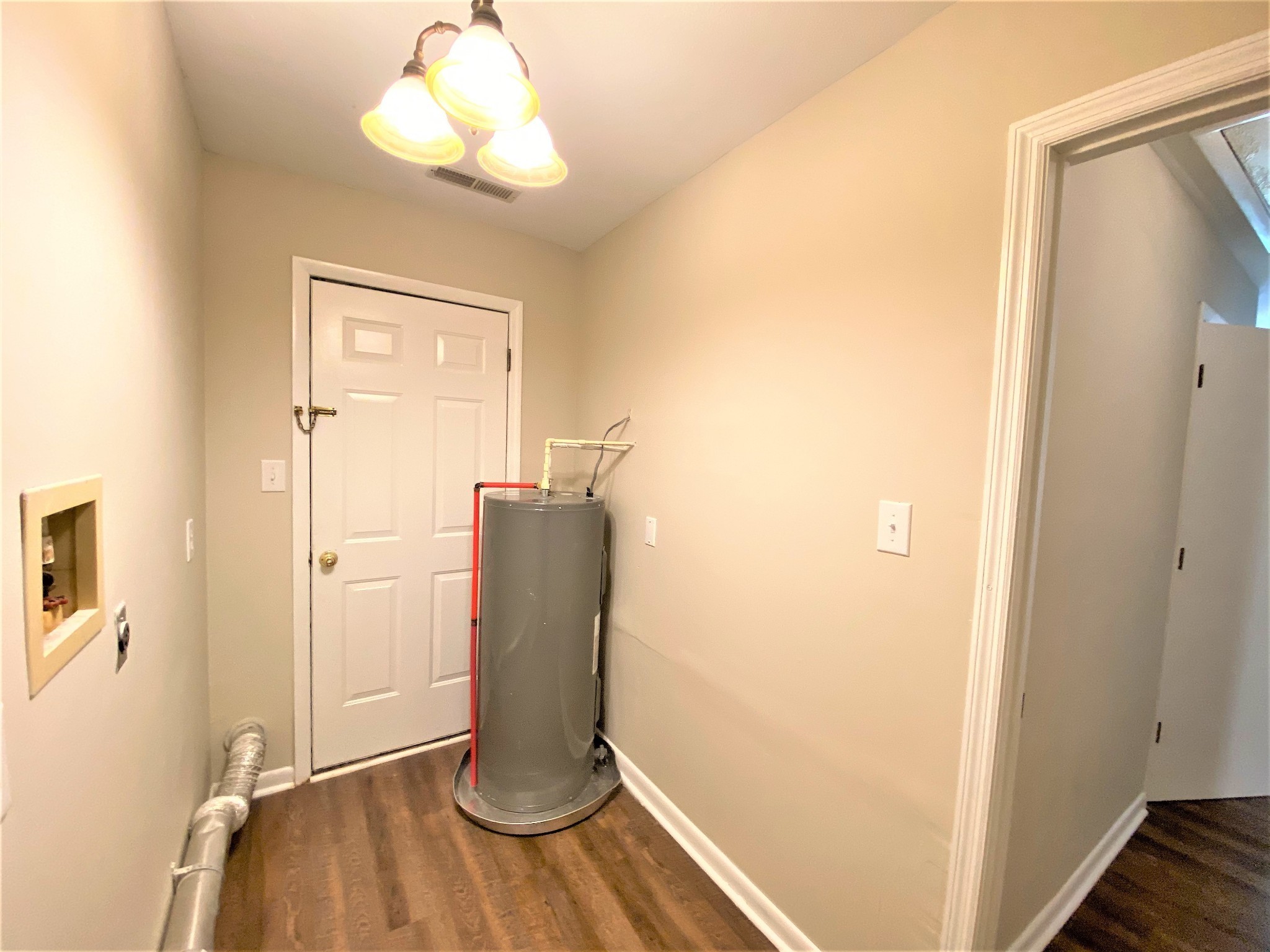 1035 West Point Road Lawrenceburg, TN 38464 - Photo 29 of 42 a view of a room with wooden floor and cabinet