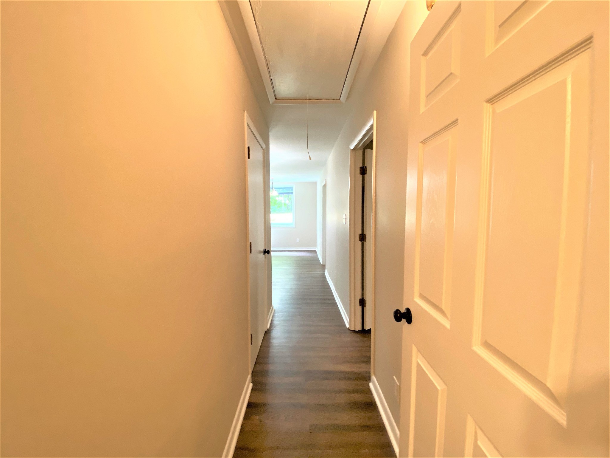 1035 West Point Road Lawrenceburg, TN 38464 - Photo 31 of 42 a view of a hallway with wooden floor