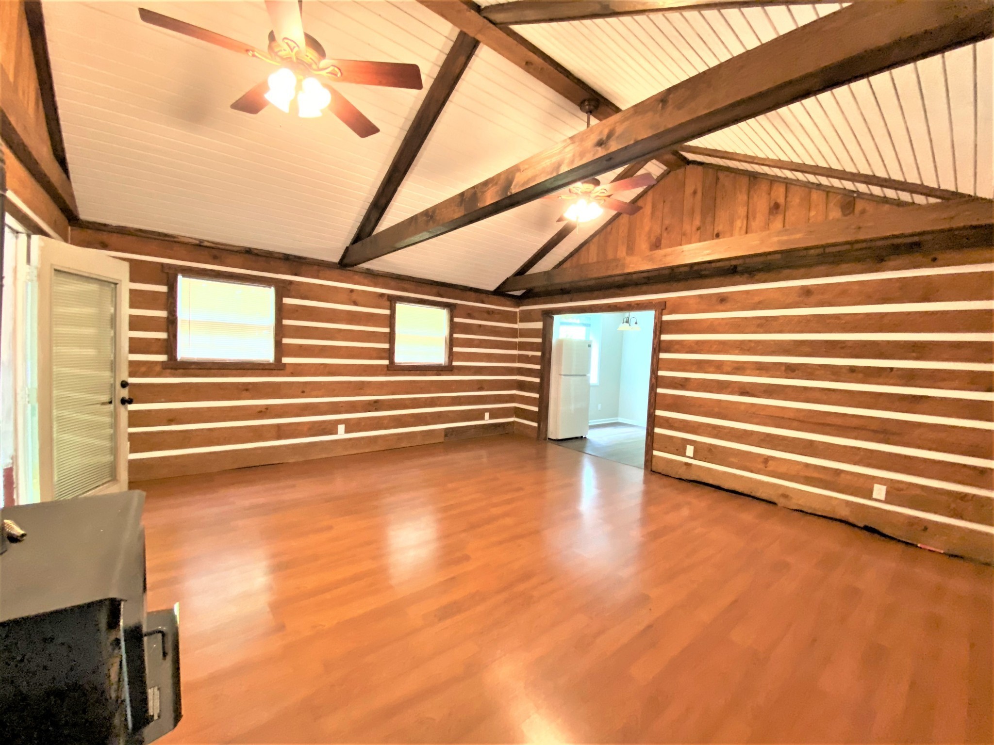 1035 West Point Road Lawrenceburg, TN 38464 - Photo 9 of 42 a view of a room with wooden floor and windows