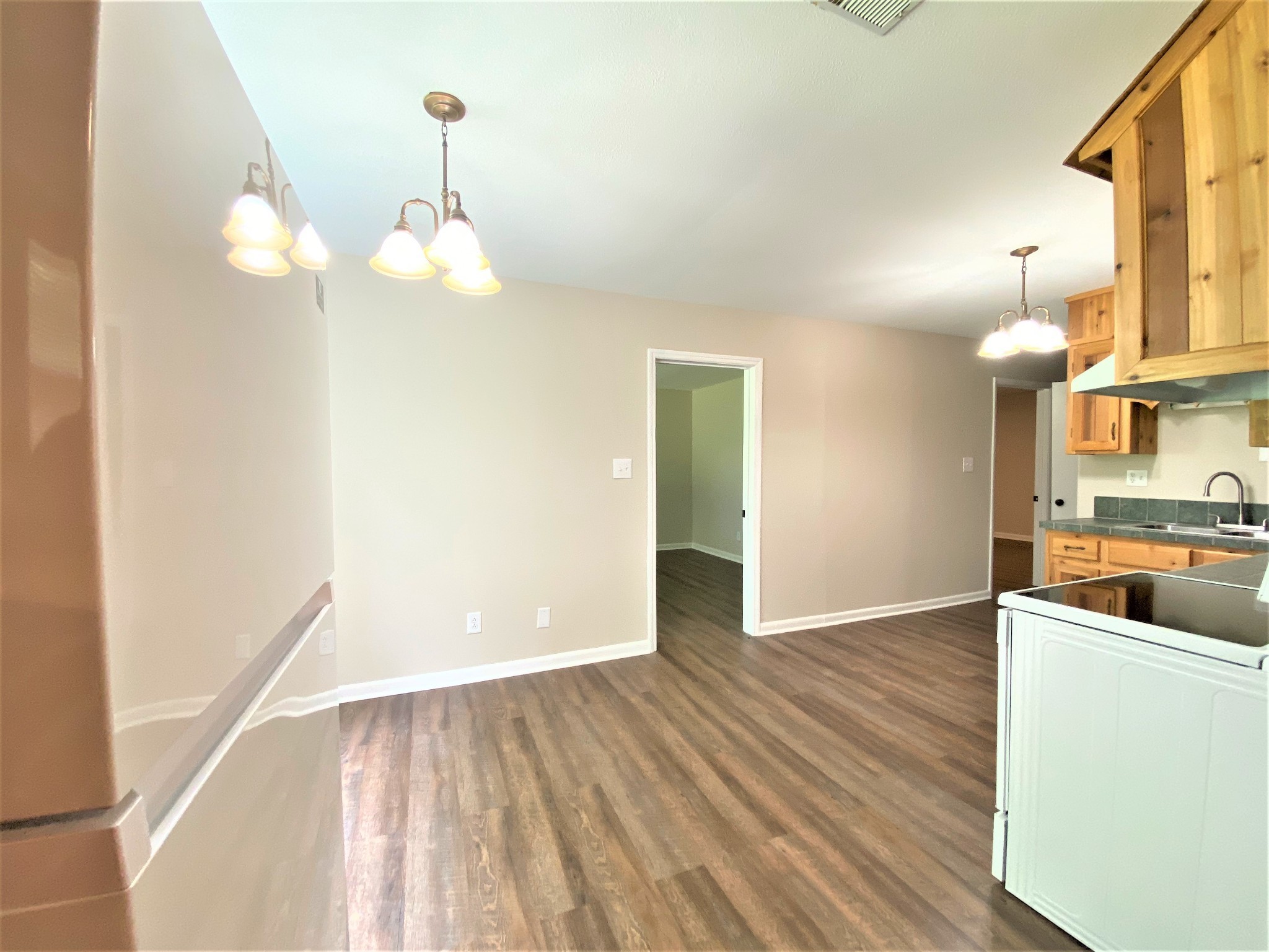 1035 West Point Road Lawrenceburg, TN 38464 - Photo 10 of 42 a view of a kitchen from the hallway