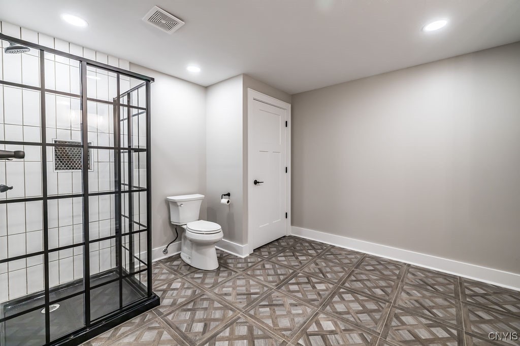 25 Chaucer Circle Lysander, NY 13027 - Photo 19 of 20 fully bath lower level with washer and dryer space