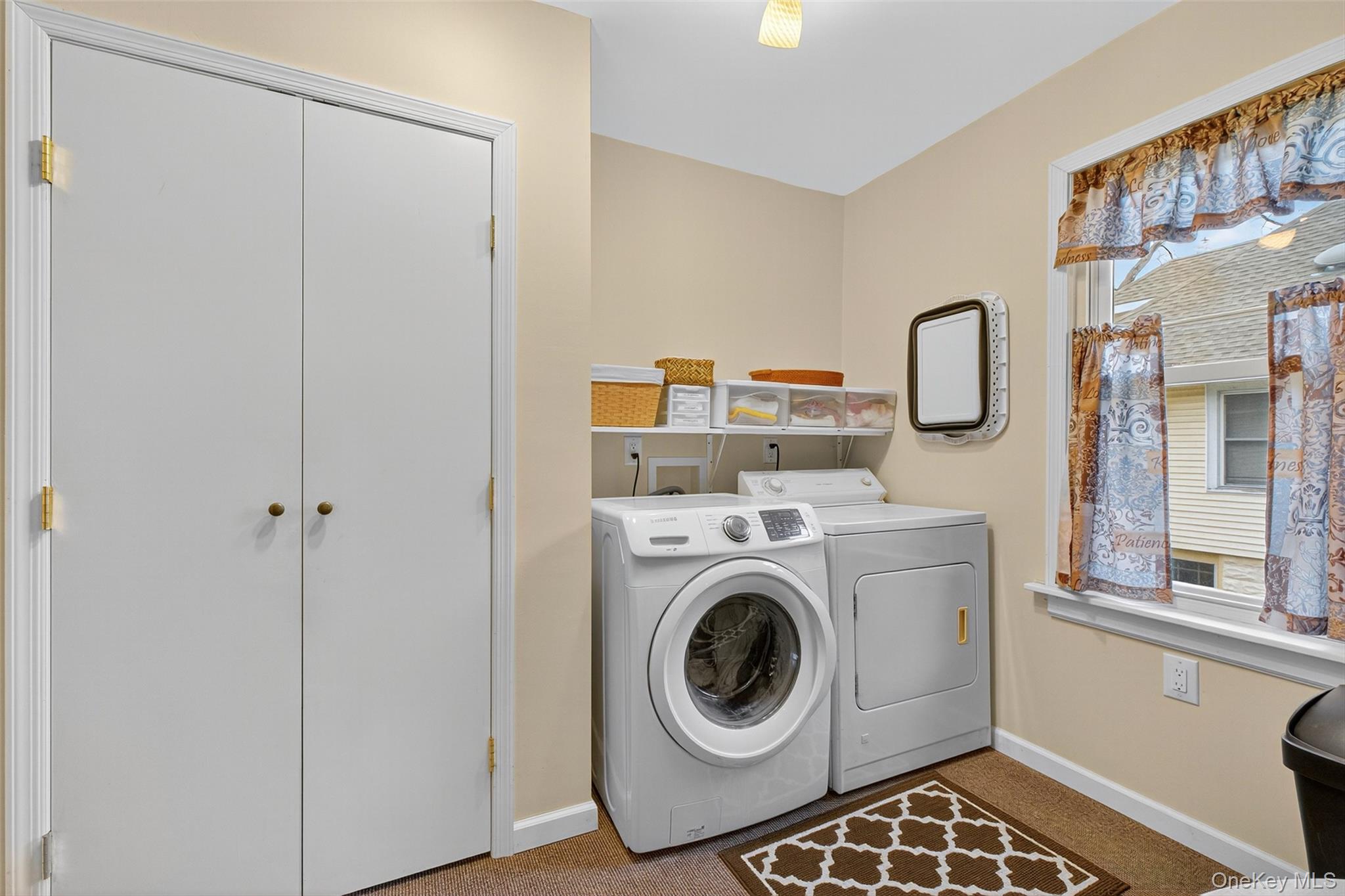 333 Canoe Hill Road Saugerties, NY 12477 - Photo 13 of 34 Washroom featuring washing machine and dryer and carpet flooring