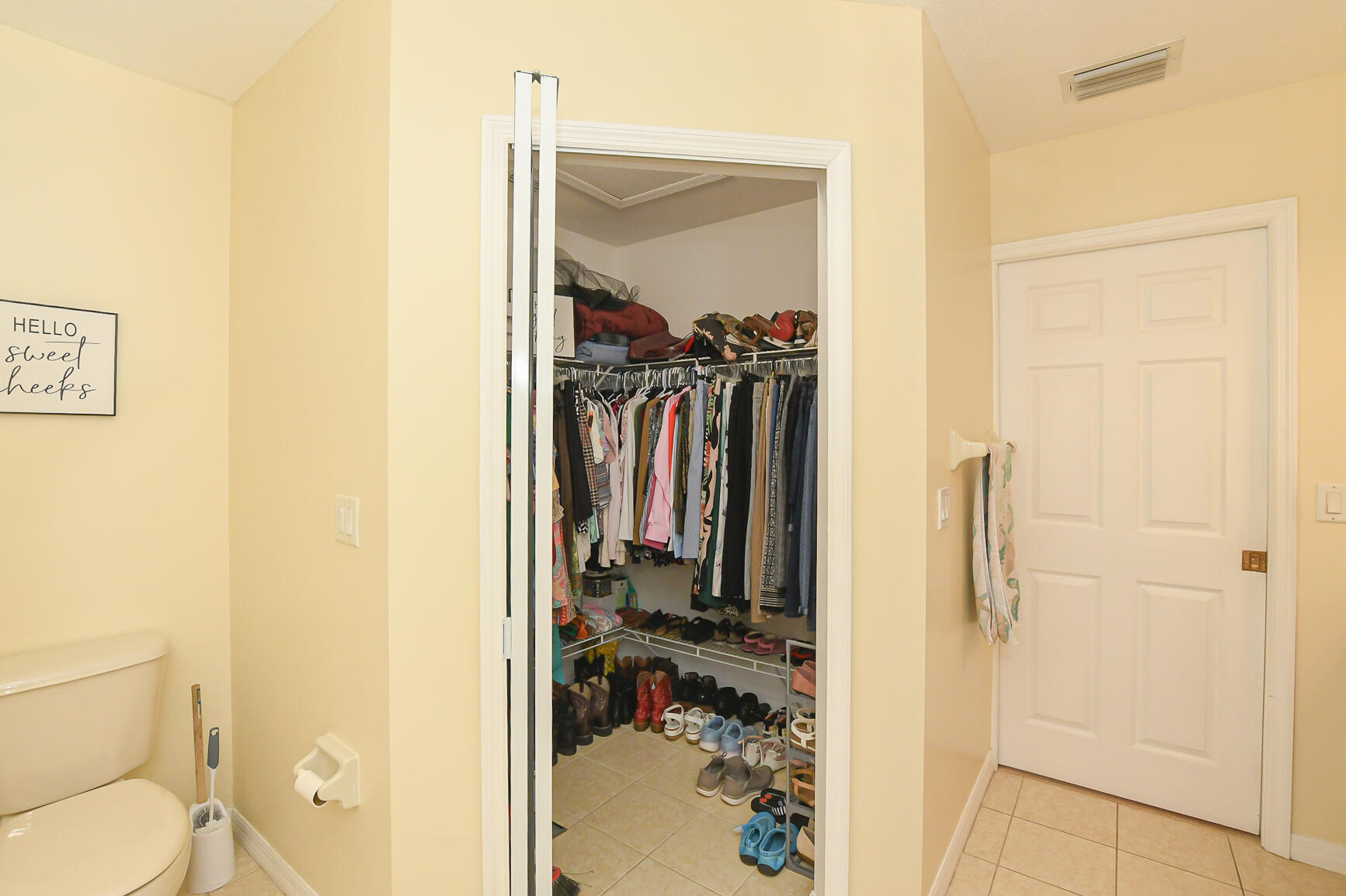 1662 Southwest Rutland Street Port St. Lucie, FL 34987 - Photo 21 of 40 a bathroom with a shower and a toilet