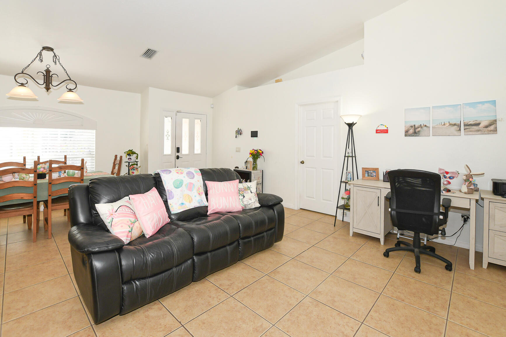 1662 Southwest Rutland Street Port St. Lucie, FL 34987 - Photo 25 of 40 a living room with furniture