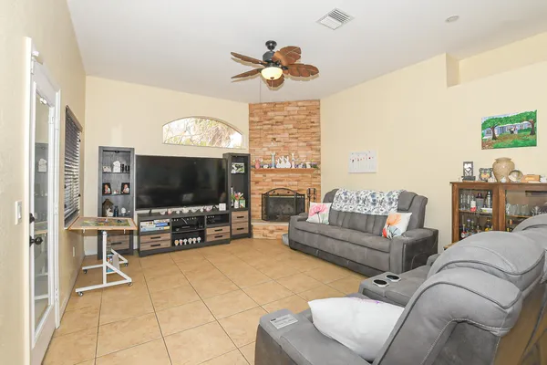 a kitchen with stainless steel appliances granite countertop a refrigerator stove and sink