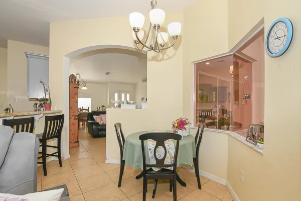 a kitchen with stainless steel appliances granite countertop a stove and cabinets