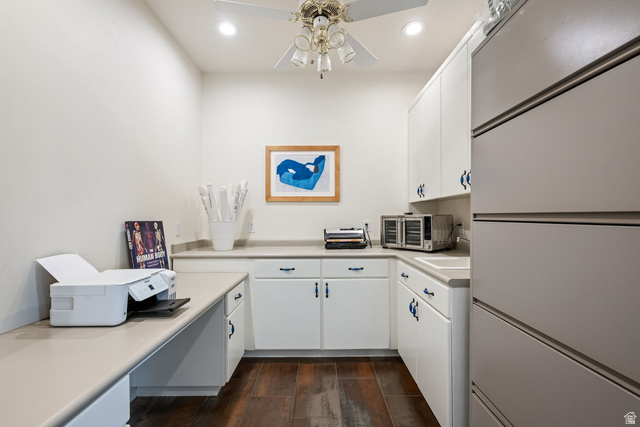779 South Silver Road Leeds, UT 84746 - Photo 22 of 80 Kitchen with white cabinetry, light countertops, dark wood-style flooring, fridge, and recessed lighting