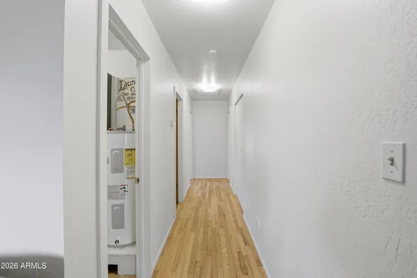 a view of a hallway with windows