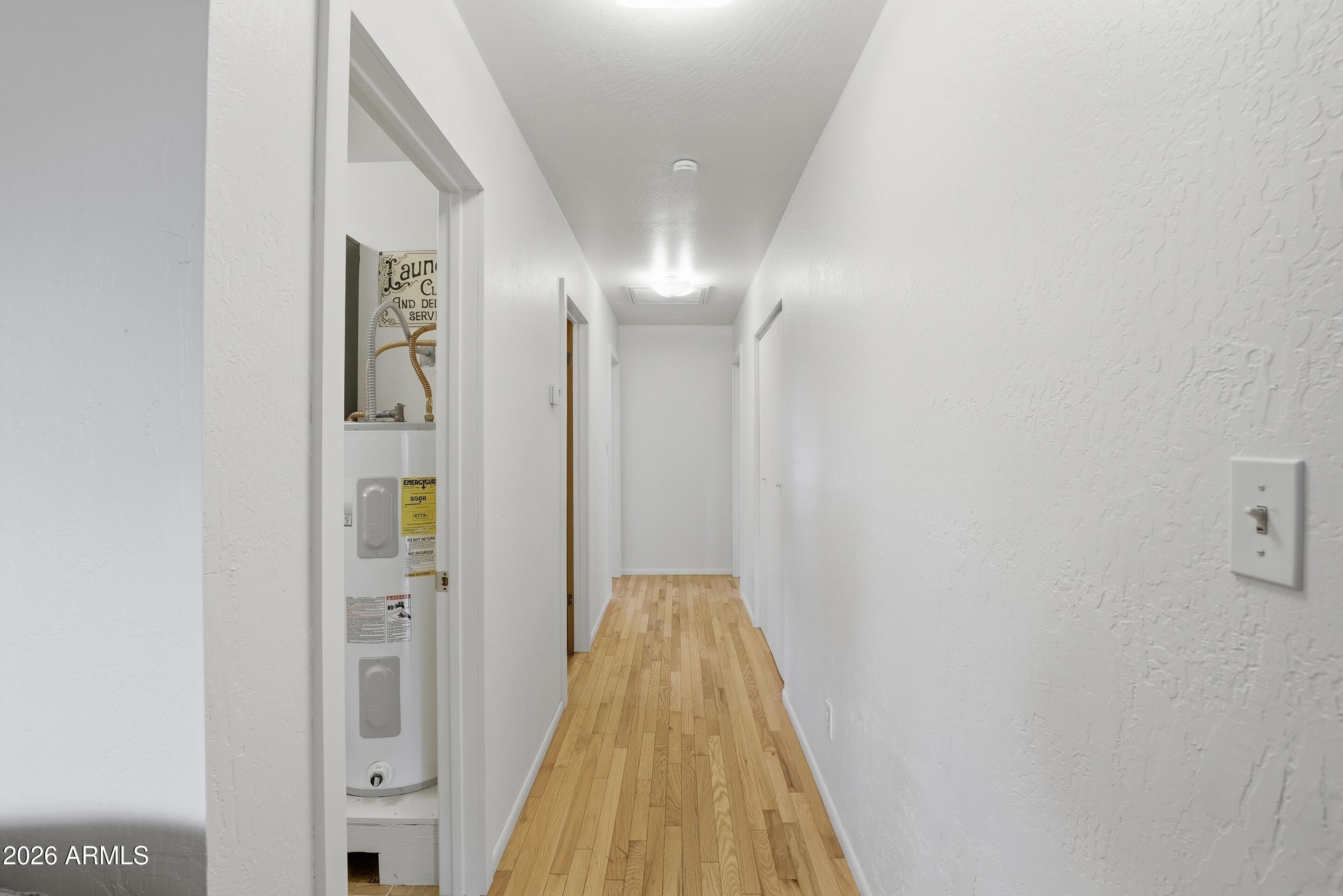5920 Robin Way Pine, AZ 85544 - Photo 13 of 55 a view of a hallway with windows