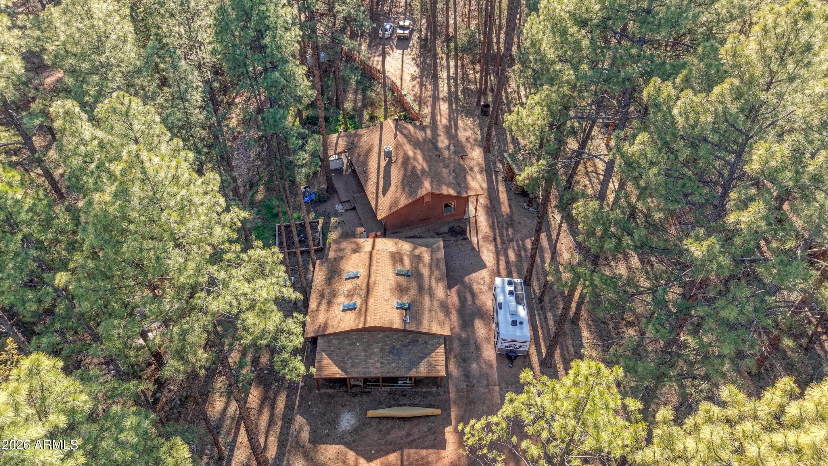 5920 Robin Way Pine, AZ 85544 - Photo 21 of 55 a backyard of a house with lots of green space