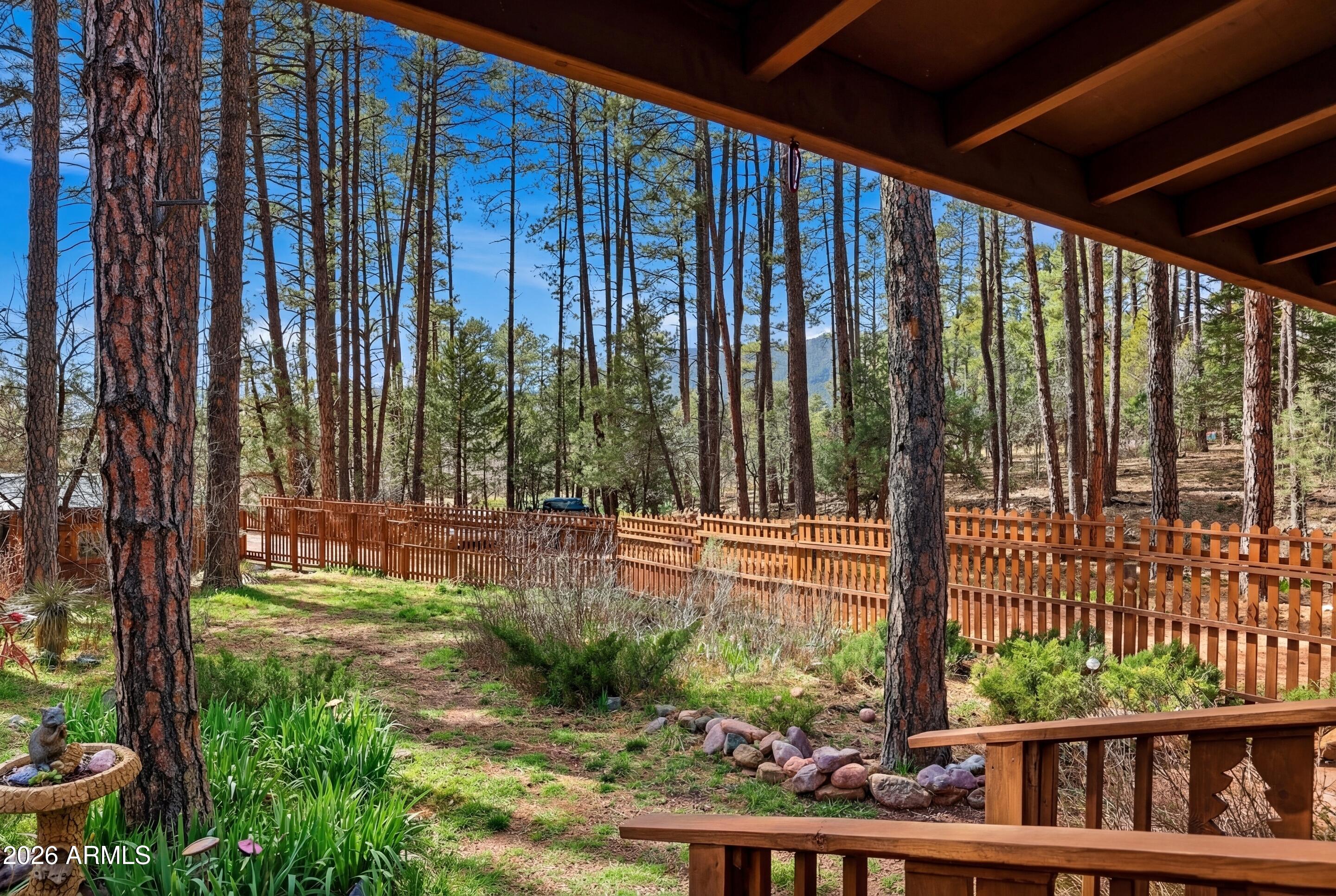 5920 Robin Way Pine, AZ 85544 - Photo 50 of 55 a view of backyard with plants and outdoor seating