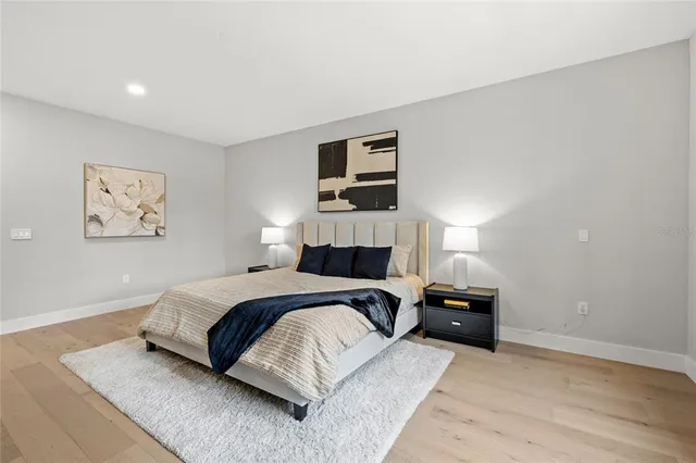 an aerial view of a house with outdoor space